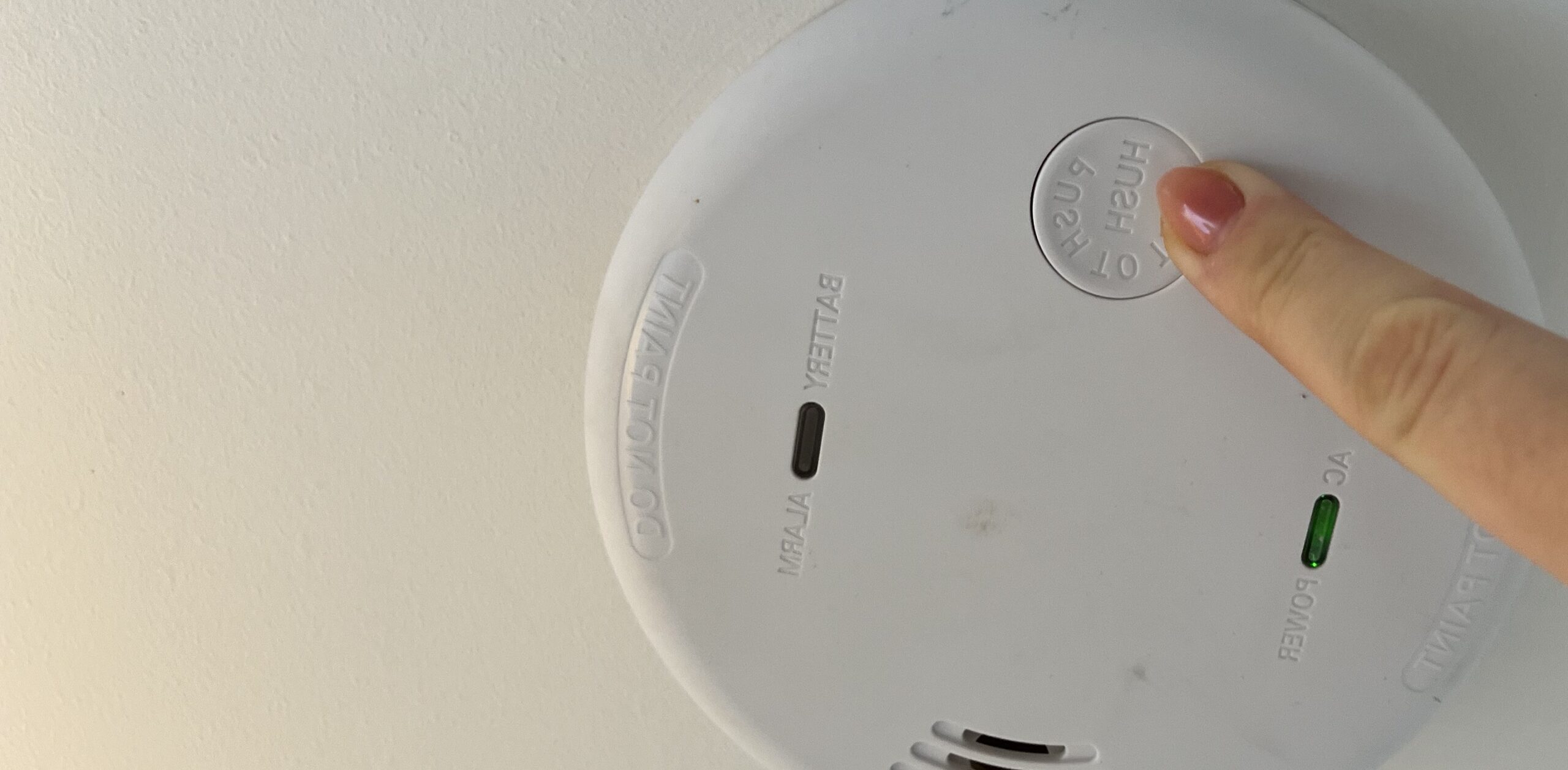 smoke alarm being tested