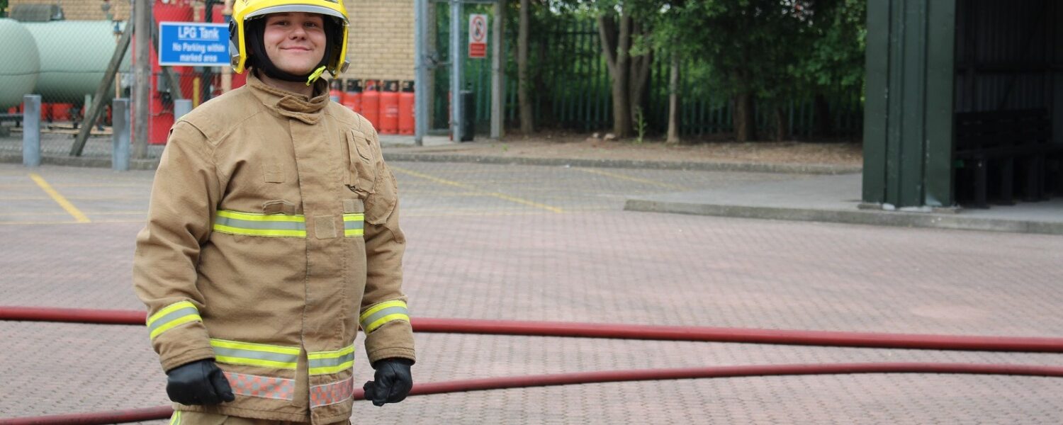 Picture of male firefighter in full kit