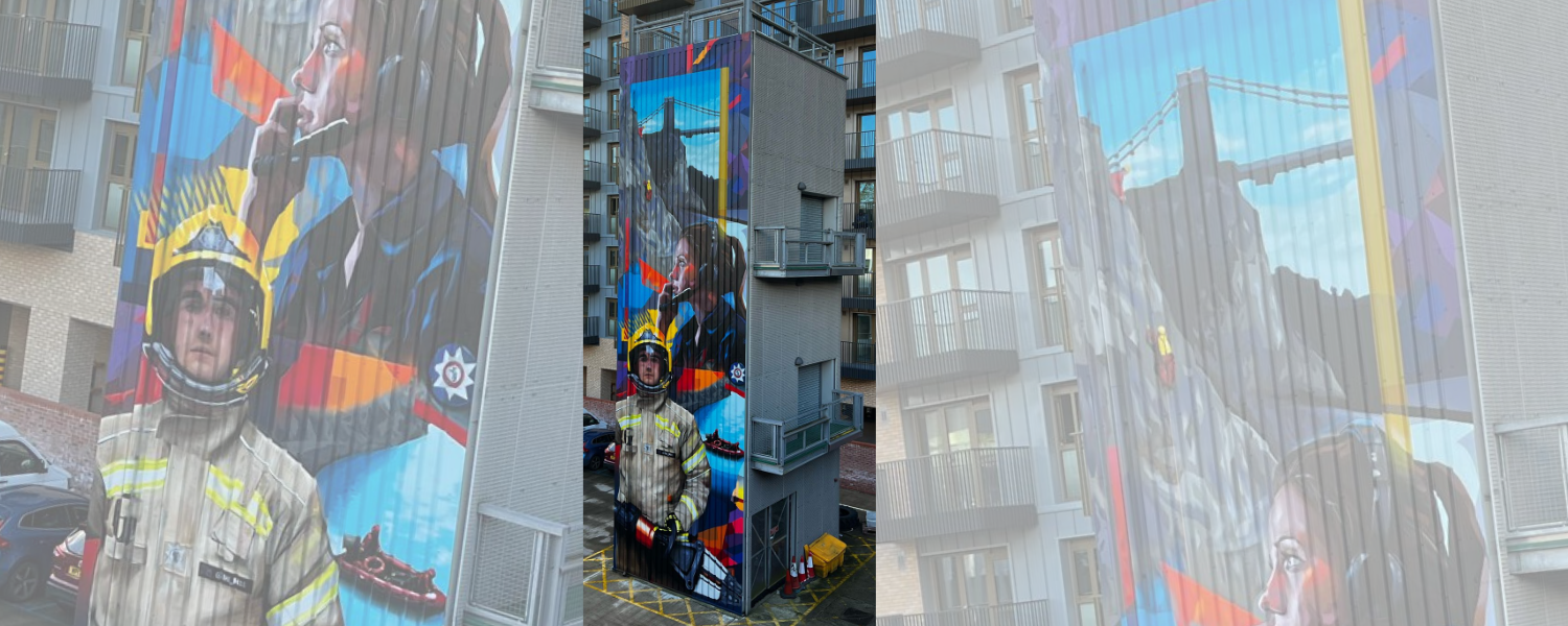 Photo of a graffiti-style mural of a firefighter and control fire operator on Temple Fire Stations Training Tower